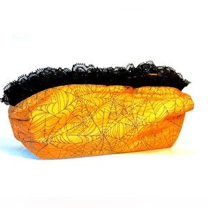 Handmade Halloween bag, orange and black with a lace ruffle and orange zipper